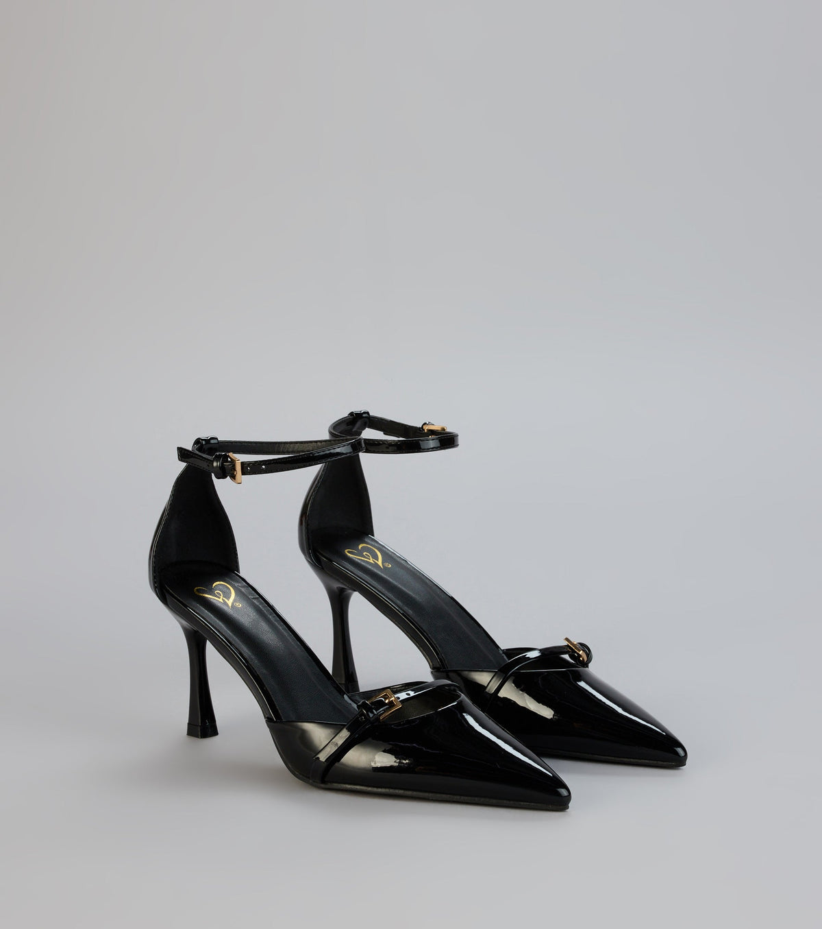 Point Taken Closed Toe Buckle Pumps