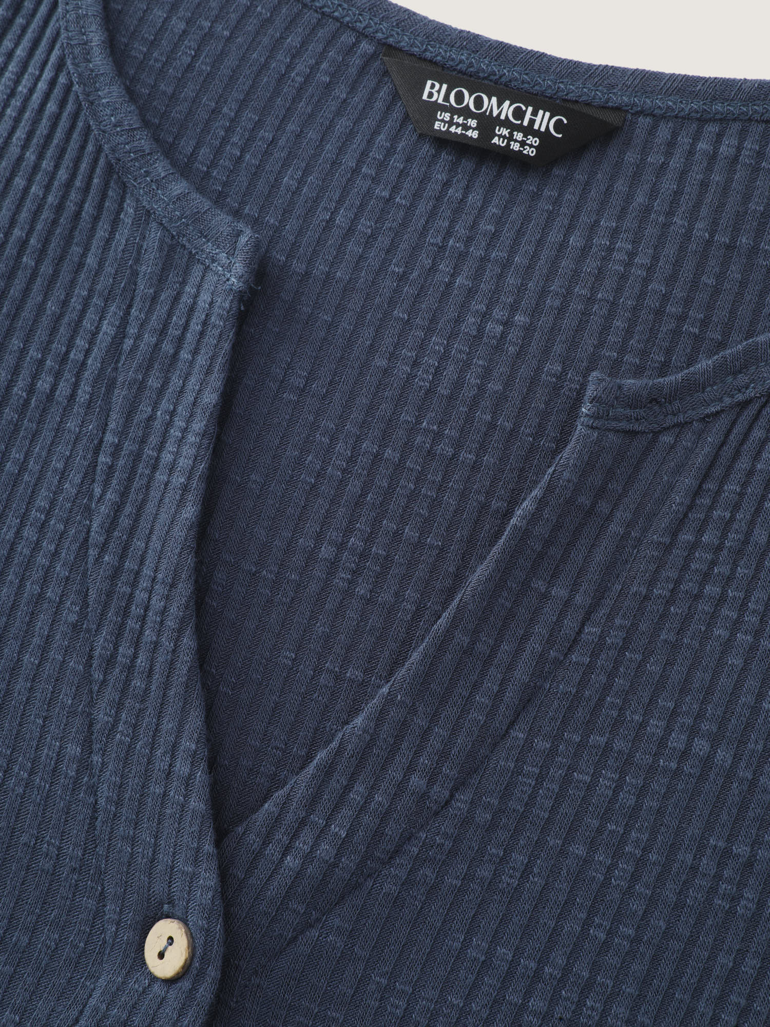Stretchy Notched Collar Button Detail Knit Top