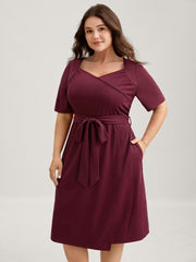 Stretchy Overlap Bodice Pockets Knit Midi Dress