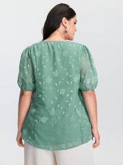 Lotus Leaf Neckline Textured Curvy Hem Blouse